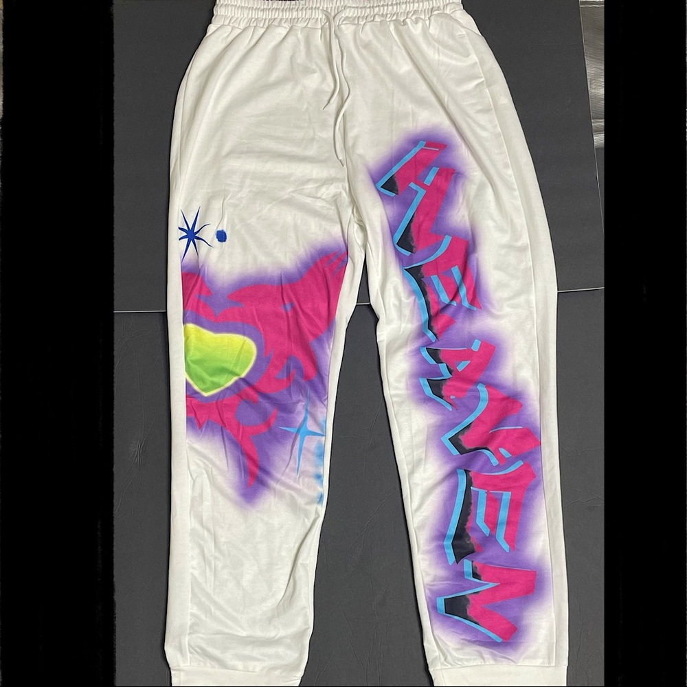 Large sweatpants, Blushmark, material is thin, white, purples, and green.